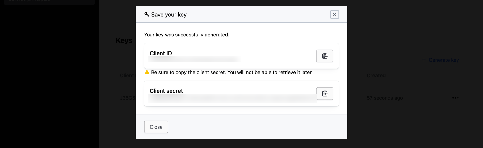 Create service principal key dialog with Client ID and Client secret
